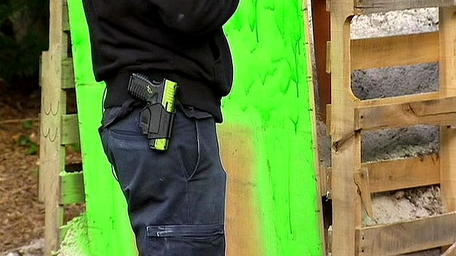 Neighbors outraged after man builds backyard gun range