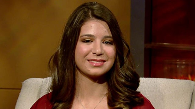 Teen wins case to keep 'under God' in Pledge