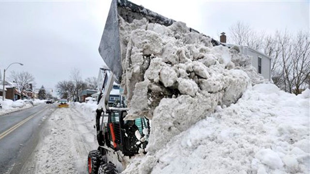 Record snowfall in Northeast renews climate change debate