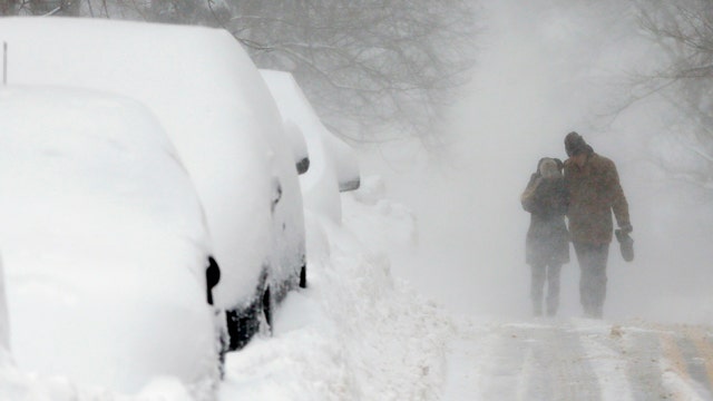 Bitter cold and more snow slams New England