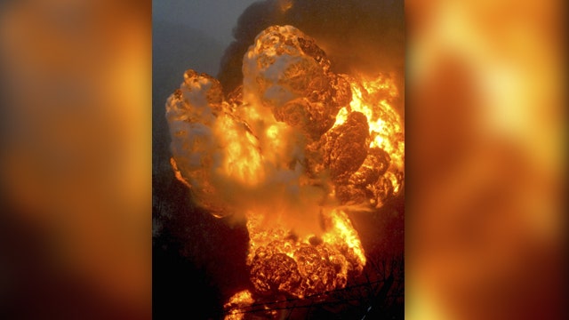 Massive fireball after train carrying oil derails, explodes