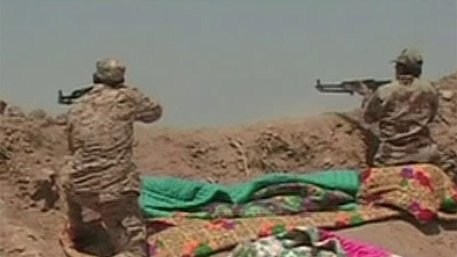 Peshmerga forces battle ISIS near Kurdish capital of Irbil