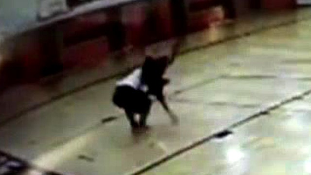Foul play! Teacher body slammed during basketball game