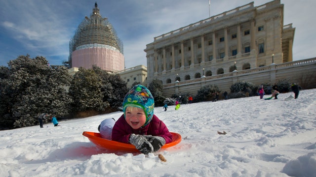 Sledding showdown on snowy Capitol Hill