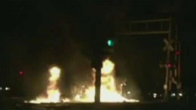 Cellphone video captures fiery aftermath of train derailment