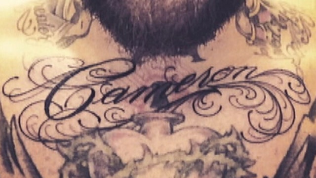 Benji tattoos Cameron on chest