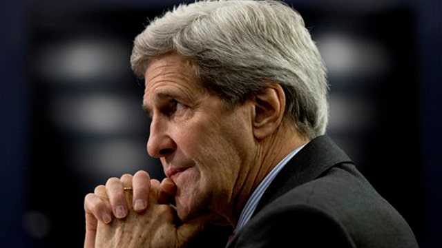 Kerry at odds of FBI, intel chiefs over threat to US