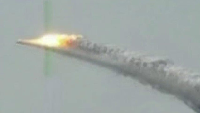 Iran test fires 'new strategic weapon' on last day of drills