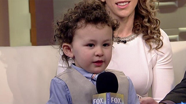 Two-year-old sings national anthem perfectly