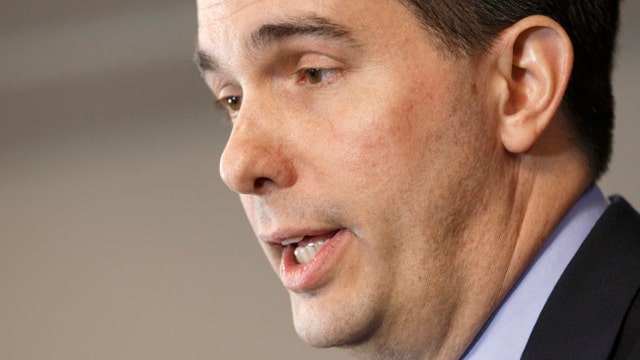 Media calling attention to flip on immigration by Walker