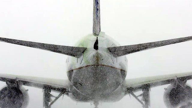 Huge winter storm leaves airline passengers stranded