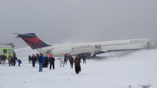 Delta jet skids off runway at New York's LaGuardia Airport
