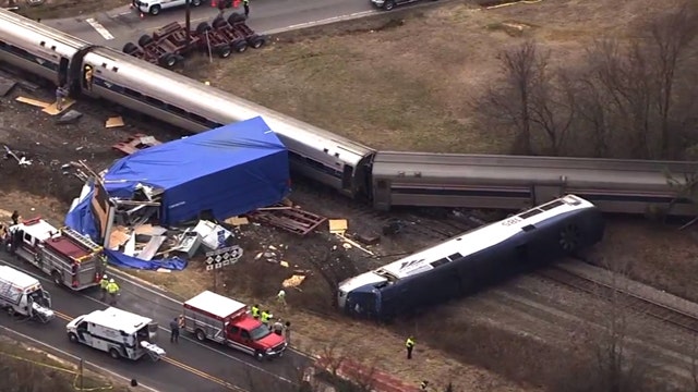 At least 55 injured after Amtrak train hits truck