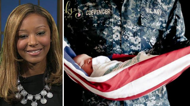 Controversy over pic of baby wrapped in American flag