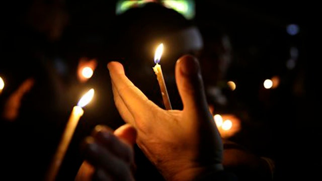 Candlelight vigil held for police officers shot in Ferguson