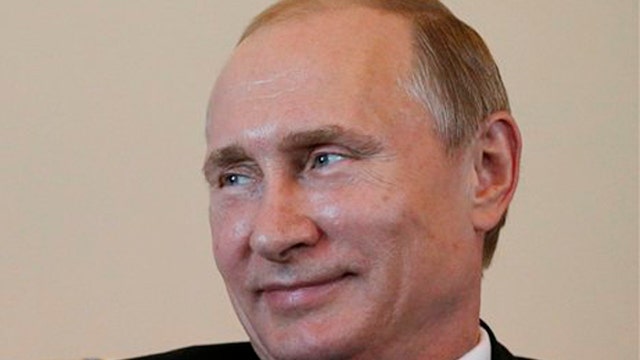 Putin returns to public spotlight amid mystery