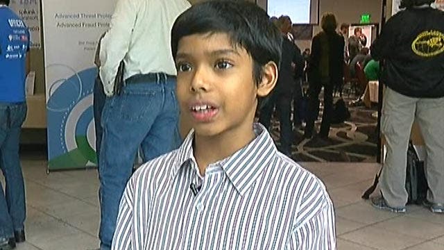 9-year-old whiz kid hacks smartphone with ease