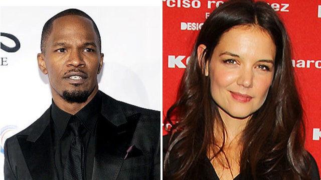 Katie Holmes and Jamie Foxx sitting in a tree?