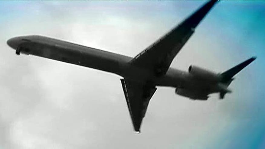 In-flight TVs and WiFi could allow hackers to turn off lights and shut off jet engines midair, analysts fear