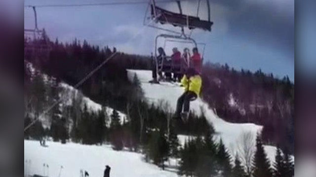 Riders forced to jump after ski lift is thrown into reverse