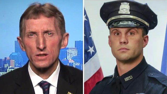 Boston cop shot in face during traffic stop