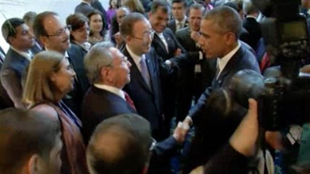 Obama and Cuban Pres. Raul Castro shake hands in Panama 
