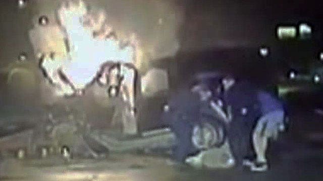 Exclusive: Texas cops pull man from burning car
