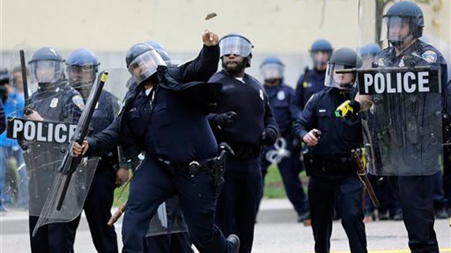 Baltimore protests over Freddie Gray's death turn violent