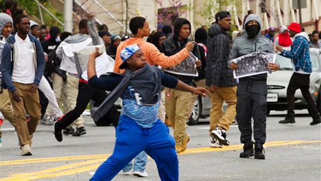 Protesters throwing rocks, bottles at police in Baltimore