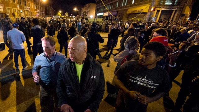 Baltimore curfew lifted after quieter night of protests