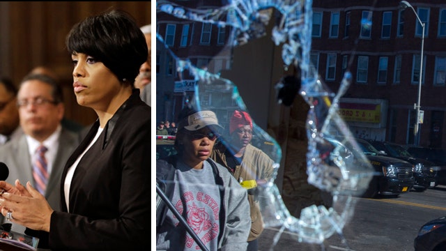 Baltimore mayor faces accusations after widespread looting