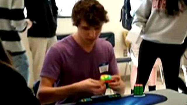 Ridiculous Rubik's Cube skills: Teen smashes world record