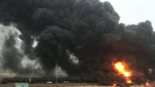 North Dakota town evacuated after oil train derailment
