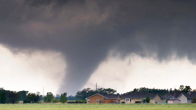 Dozens of tornadoes slam Central Plains