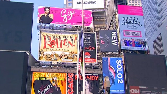 Iconic billboards, neon signs will stay in Times Square