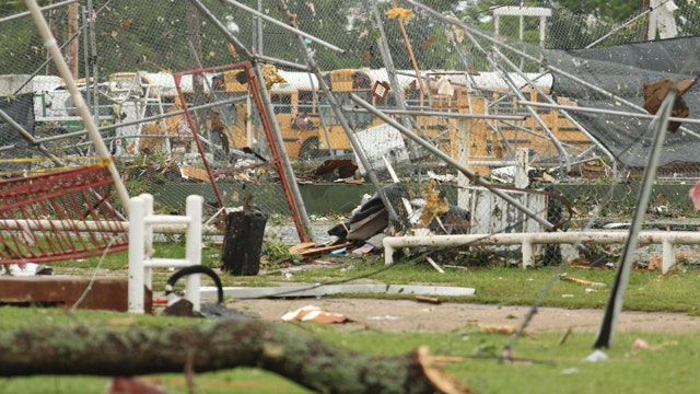 Deadly storms tear through Texas and Arkansas