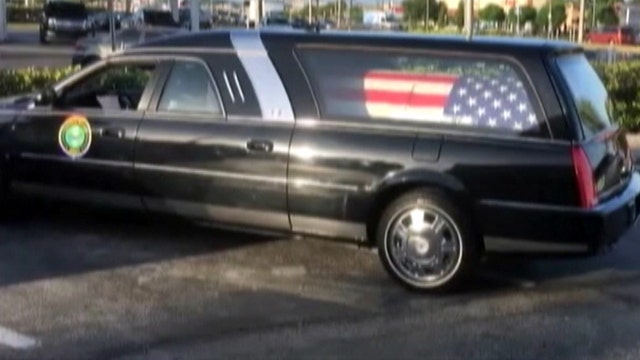 Hearse carrying veteran spotted at Dunkin' Donuts