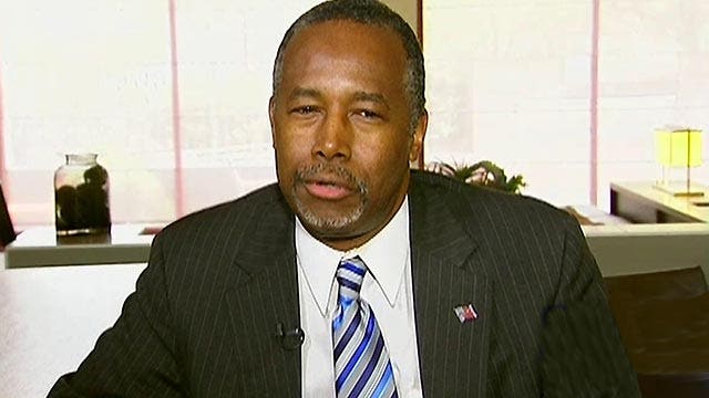 Ben Carson reacts to surging ahead in the polls