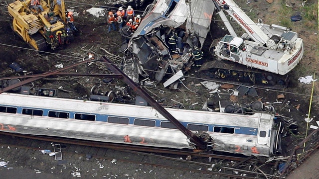 Deadly derailment highlights divide over rail spending