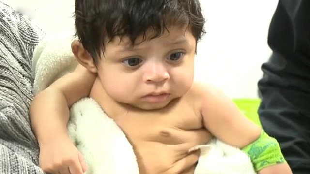Baby makes history with heart transplant
