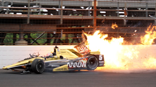 Indy car bursts into flames after wreck during practice