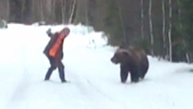Man's roar scares off charging bear