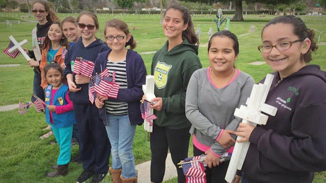 Girl Scouts replace flags stolen from veterans' graves