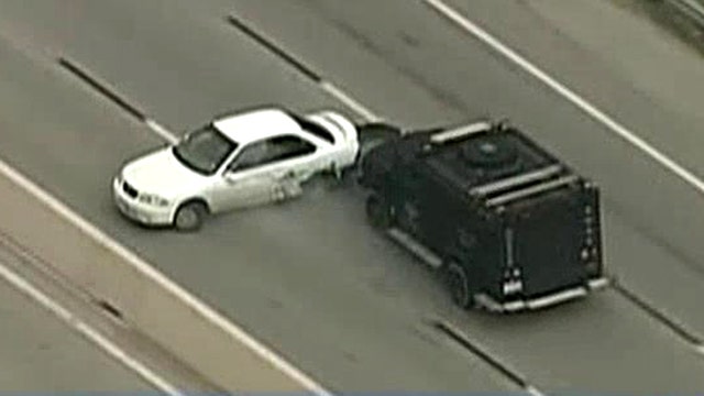 SWAT truck rams car to stop high-speed chase