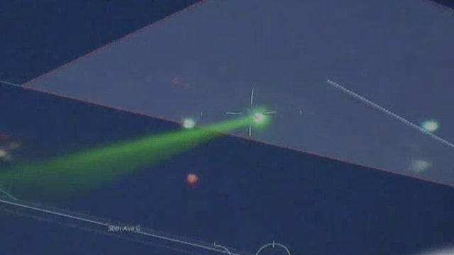 Green laser pointed at four planes over Long Island