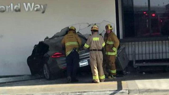 Car slams into LAX terminal, 9-year-old girl critically hurt