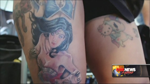 Body art enthusiasts show off their ink