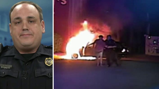 South Carolina cop pulls driver from burning car