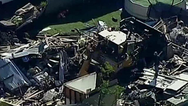 Stolen bulldozer plows into Australian family's home