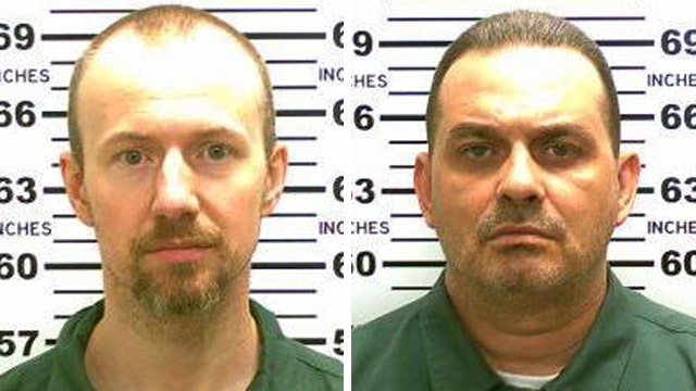 Manhunt under way for escaped murderers